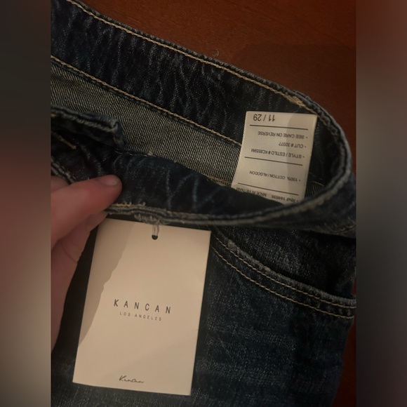 Brand new. Denim jeans with fringe on bottom. - Picture 3 of 3